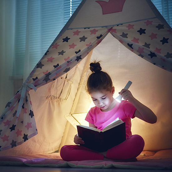 girl-reading-in-tent